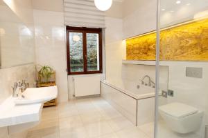 Kúpeľňa v ubytovaní Zlatý Pelikán Apartments