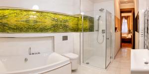 Kúpeľňa v ubytovaní Zlatý Pelikán Apartments