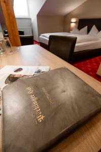 Postel nebo postele na pokoji v ubytování Hotel Pockinger Hof