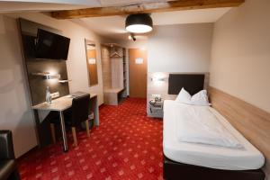 Postel nebo postele na pokoji v ubytování Hotel Pockinger Hof + 37 fotografií