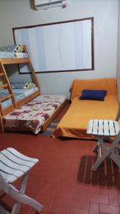 Una cama o camas en una habitación de Villa Morra house III