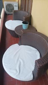 Un lugar para sentarse en Villa Morra house III