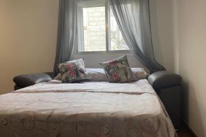 Ένα ή περισσότερα κρεβάτια σε δωμάτιο στο Apartamento Verín-Chaves con parking