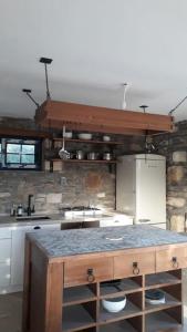 Kuchyň nebo kuchyňský kout v ubytování Tarihi Köyde Taş Ev