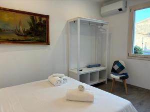 Postel nebo postele na pokoji v ubytování Jimy House
