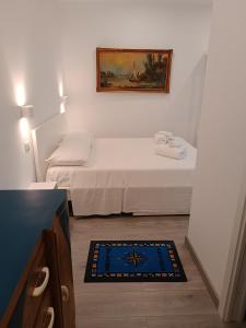 Postel nebo postele na pokoji v ubytování Jimy House