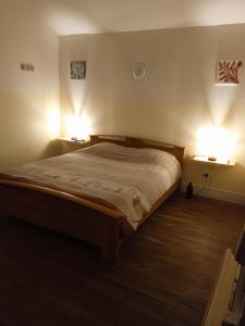 Postel nebo postele na pokoji v ubytování Auberge Gordonienne + 12 fotografií