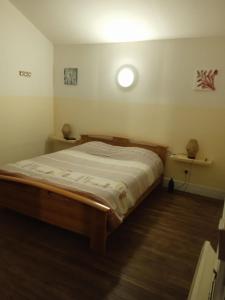 Postel nebo postele na pokoji v ubytování Auberge Gordonienne