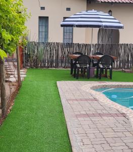 Bazén v ubytování Maun Luxury Oasis nebo v jeho okolí