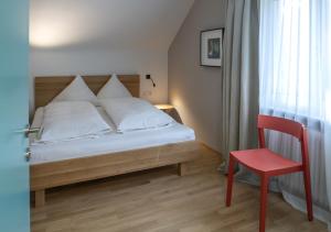 Letto o letti in una camera di Gasthof Löwen Tosters