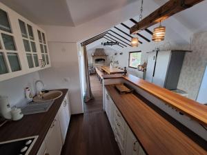 Kuchyň nebo kuchyňský kout v ubytování La Villa Casa