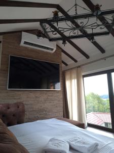 Postel nebo postele na pokoji v ubytování La Villa Casa