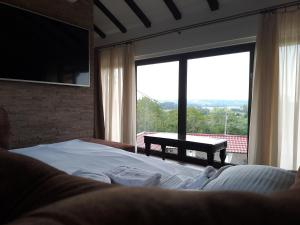 Postel nebo postele na pokoji v ubytování La Villa Casa