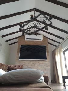 TV a/nebo společenská místnost v ubytování La Villa Casa