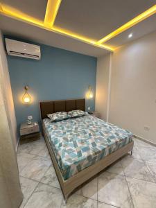 Postel nebo postele na pokoji v ubytování Blue'ming Sousse