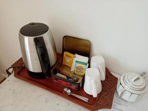 Kaffi- og teaðstaða á Rose Garden Bayeux