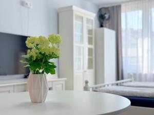 Postel nebo postele na pokoji v ubytování Apartment Střížkov