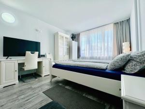 Postel nebo postele na pokoji v ubytování Apartment Střížkov