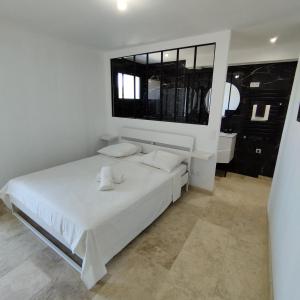 Ένα ή περισσότερα κρεβάτια σε δωμάτιο στο Mas en Provence +58 φωτογραφίες