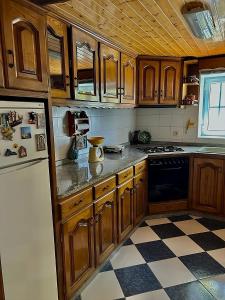Kuchyň nebo kuchyňský kout v ubytování Casa 3 Irmãs