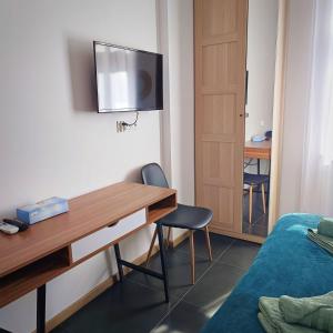 TV a/nebo společenská místnost v ubytování MH Apartment