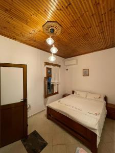 Postel nebo postele na pokoji v ubytování Guesthouse Klajd
