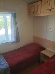 Postel nebo postele na pokoji v ubytování l Aire Tranquille