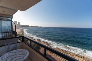 a balcony with a view of the ocean at Spacious - Beautiful - Sea Front in Sliema