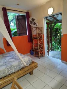Postel nebo postele na pokoji v ubytování Tikazalou Eco Hostel