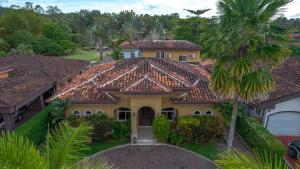 an aerial view of a house with a tiled roof at Villa Estrella De Mar By Vacation Pura Vida in Bejuco