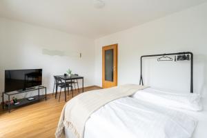 Postel nebo postele na pokoji v ubytování FarawayHomes Studio Graz #10