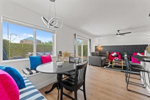 a living room with a table and a couch at Windfield Condo In The Entertainment District in Scottsdale