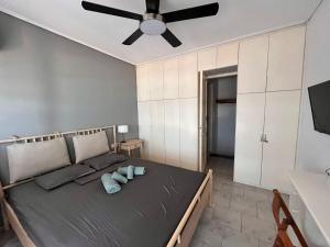 Postel nebo postele na pokoji v ubytování Endless Blue Maisonette
