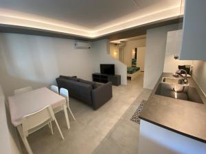 Posezení v ubytování NEW Residenza le Essenze - i 7 Laghi