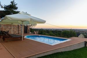 Bazén v ubytování Sunset Home nebo v jeho okolí