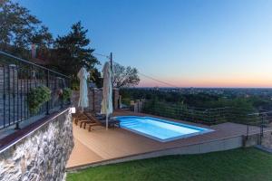 Bazén v ubytování Sunset Home nebo v jeho okolí