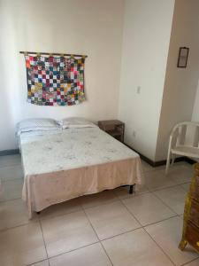 Casa Bella barra do Jacuípeにあるベッド