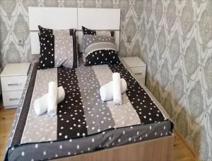 Postel nebo postele na pokoji v ubytování Eldeniz Nuxa House