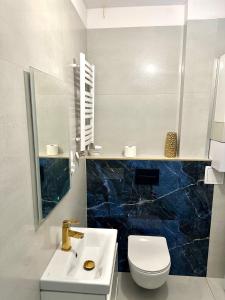 Kúpeľňa v ubytovaní Apartament Wygodny S2