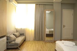 Letto o letti in una camera di Hotel Martini Kvariati