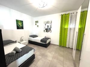 Posteľ alebo postele v izbe v ubytovaní Villa Chiara