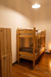 Postel nebo postele na pokoji v ubytování DOS SANTOS HOSTEL + 49 fotografií