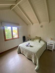 Postel nebo postele na pokoji v ubytování Departamento Artemisa