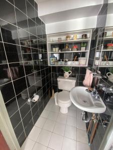 Koupelna v ubytování Habitación casa Andy