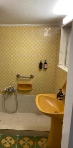 a bathroom with a sink and a shower at Blue Cozy Nest in Rhodes Town
