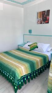 Postel nebo postele na pokoji v ubytování Hôtel Etoile de Mer