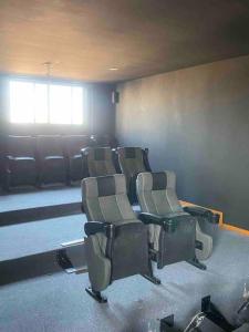 Posezení v ubytování Hermoso loft con excelente ubicación y amenidades + 15 fotografií