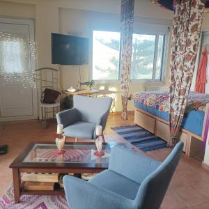 Μια τηλεόραση ή/και κέντρο ψυχαγωγίας στο Kyllini am Meer relaxen mit Hund