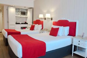 Postel nebo postele na pokoji v ubytování Ramada by Wyndham Buenos Aires Centro