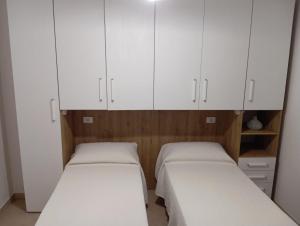Postel nebo postele na pokoji v ubytování B&B Guesthouse La Casetta Di Sutri sulla Francigena